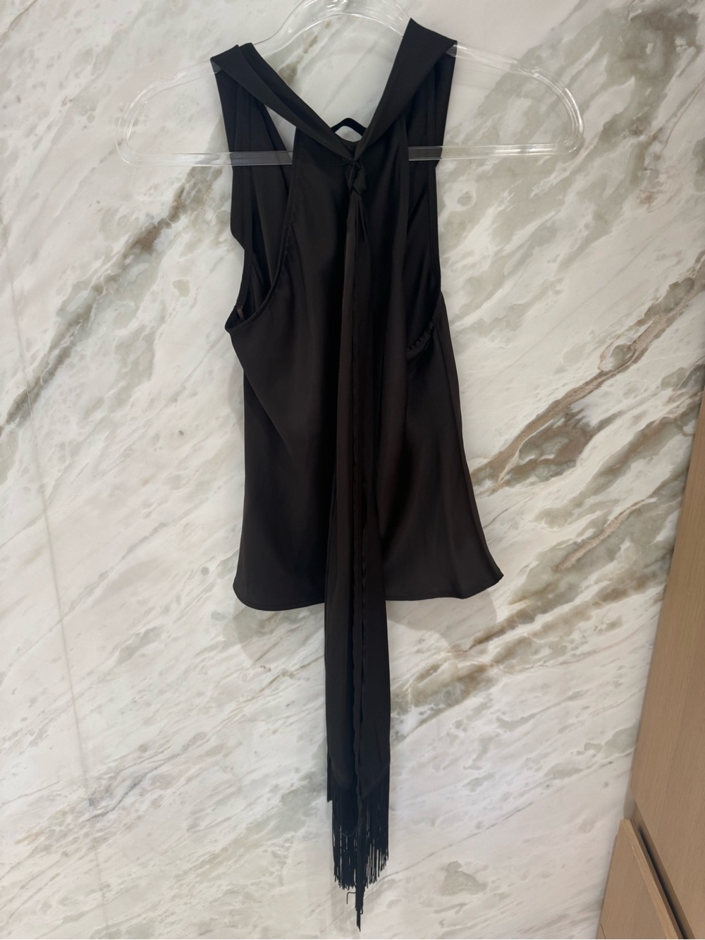 Chocolate Brown top with tie with finger in back. Slips over. Small